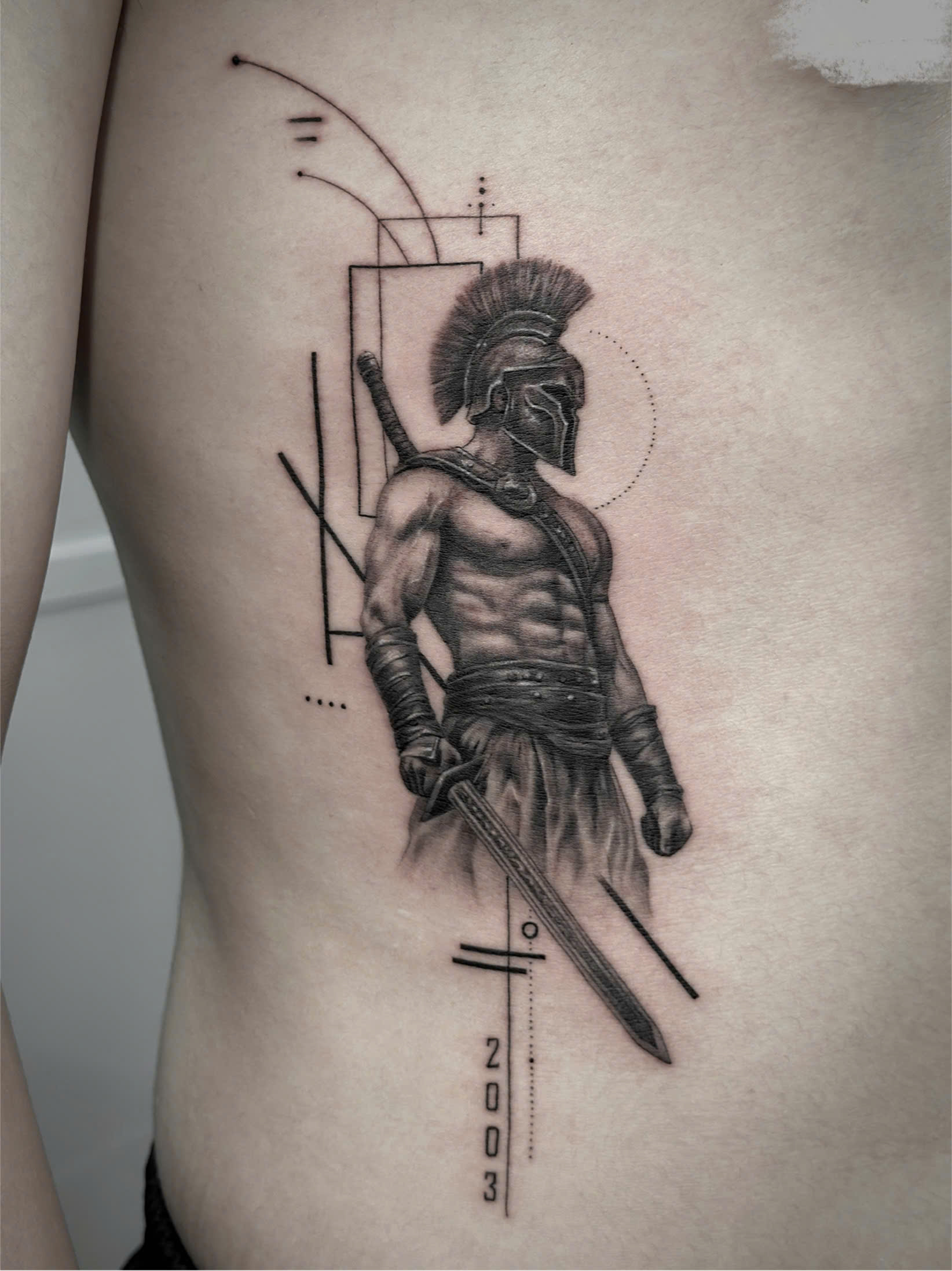 REALISM tattoo